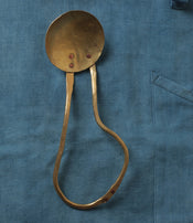 Brass serving spoon by Sebastião Lobo