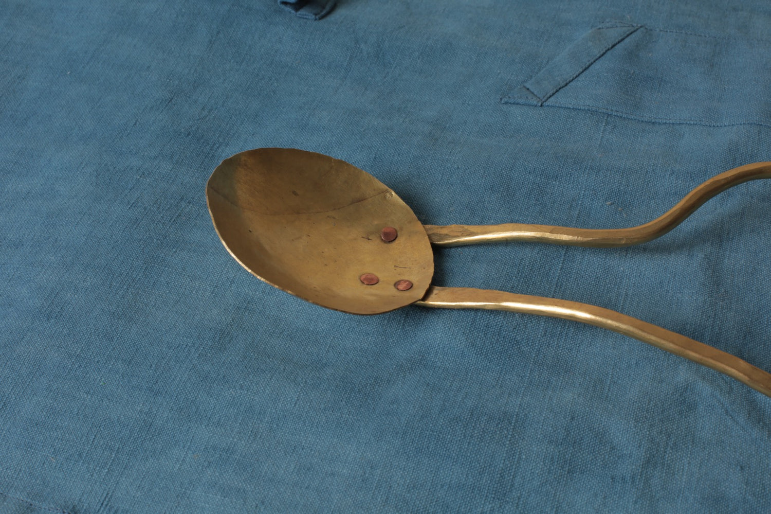 Brass serving spoon by Sebastião Lobo