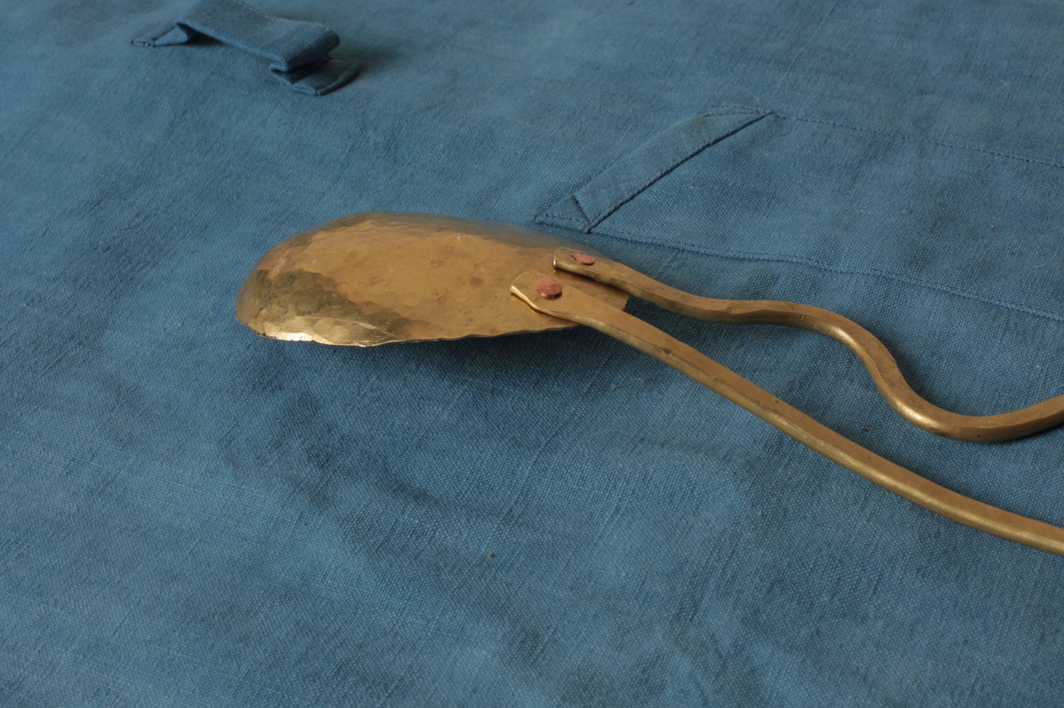 Brass serving spoon by Sebastião Lobo