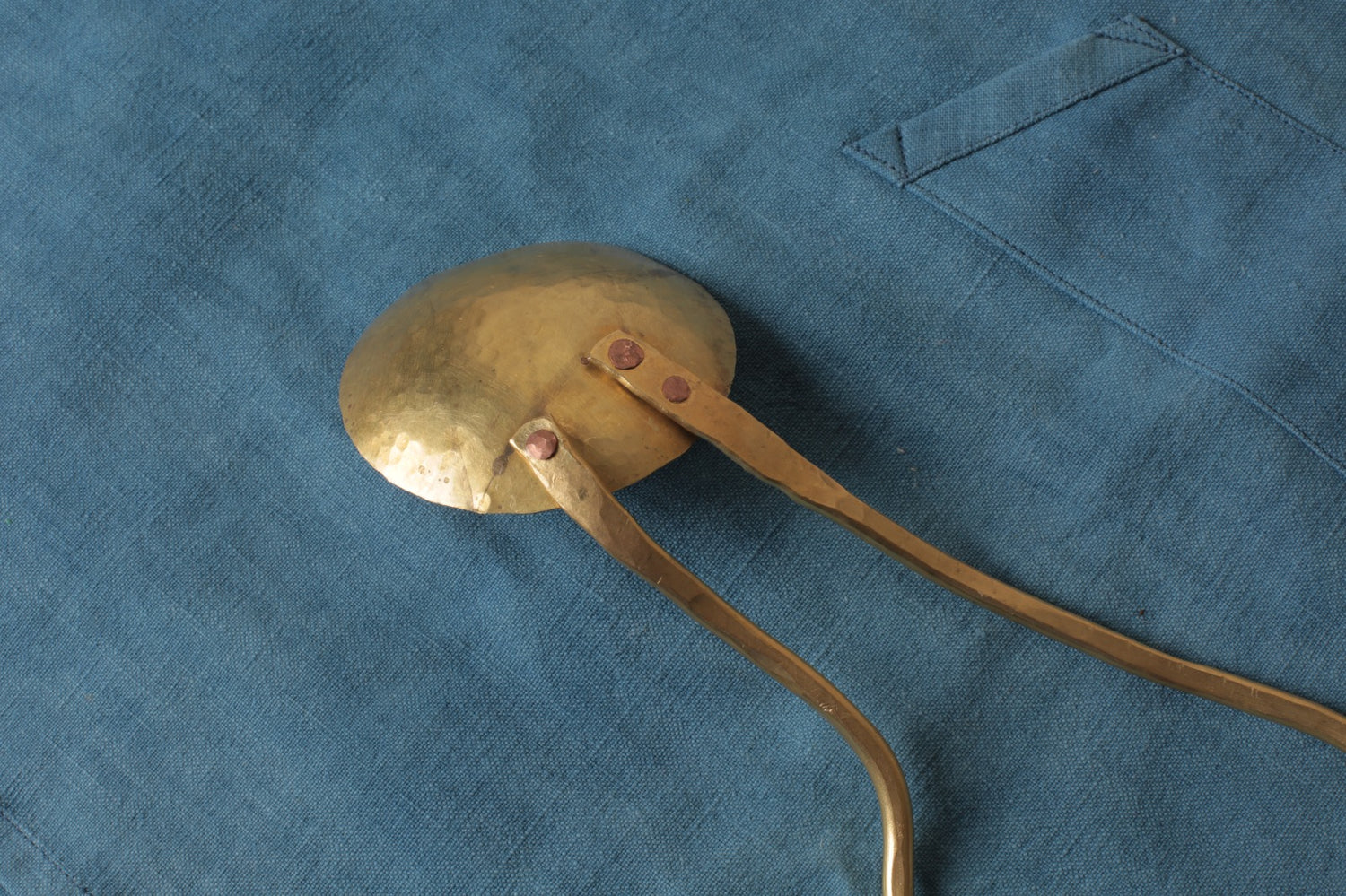 Brass serving spoon by Sebastião Lobo