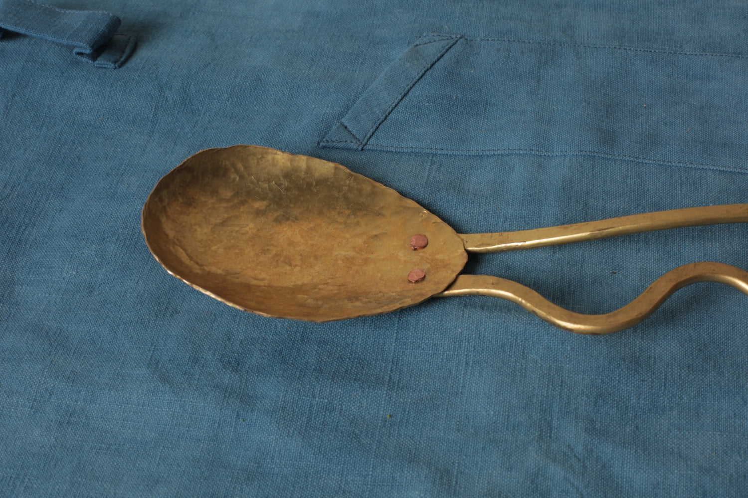 Brass serving spoon by Sebastião Lobo