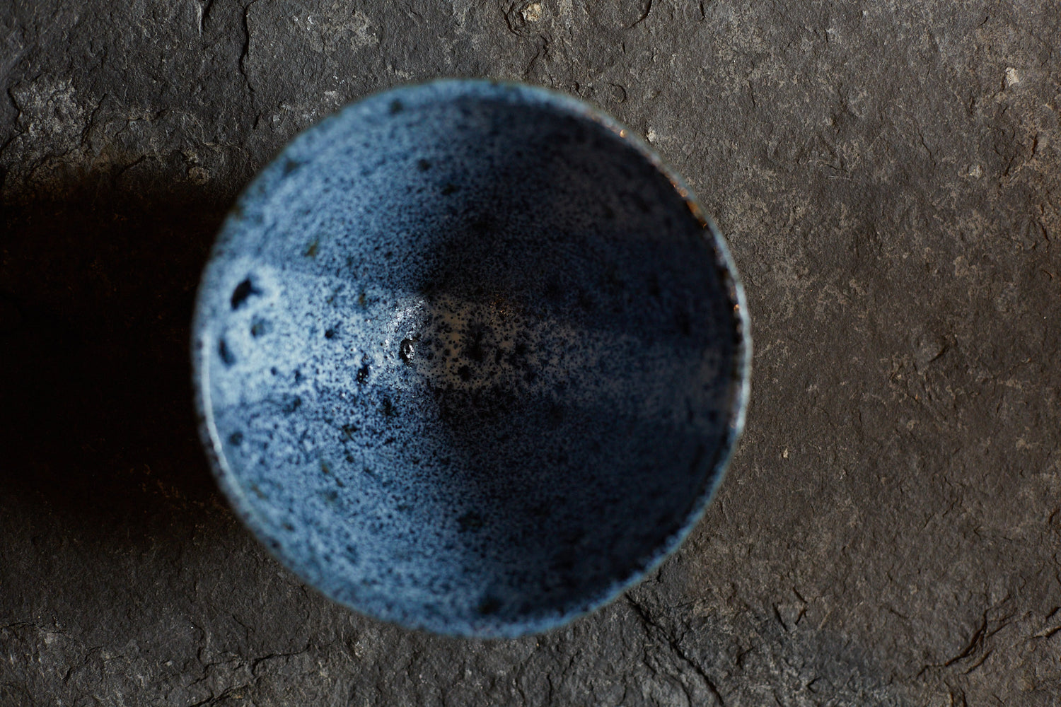 Black stoneware bowl by Sara Mauvilly