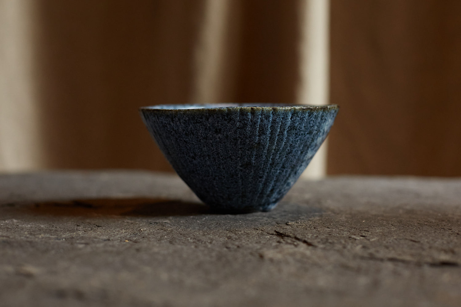 Black stoneware bowl by Sara Mauvilly