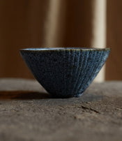 Black stoneware bowl by Sara Mauvilly