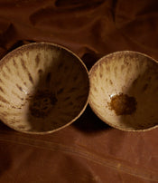Ochre stoneware bowl by Jerôme Hirson