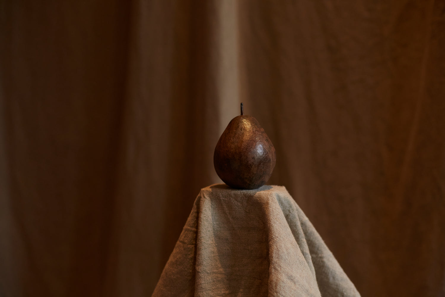 Bronze pear by Alice-Andrea Ewing  