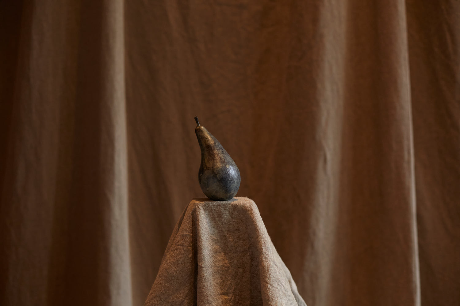 Bronze pear by Alice-Andrea Ewing 