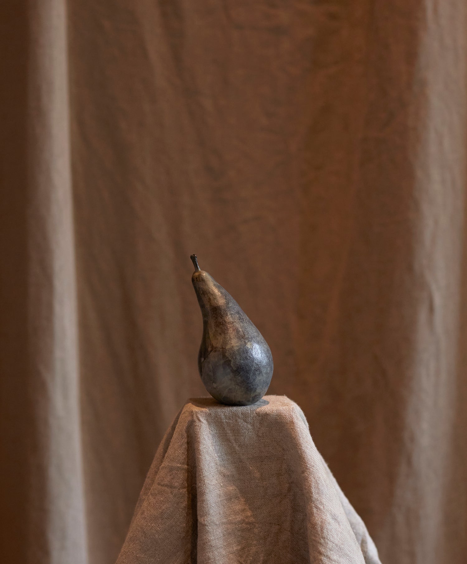 Bronze pear by Alice-Andrea Ewing 