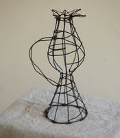 Steel wire candle holder by Clara Denidet  