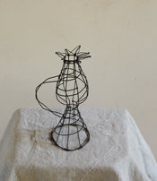 Steel wire candle holder by Clara Denidet  