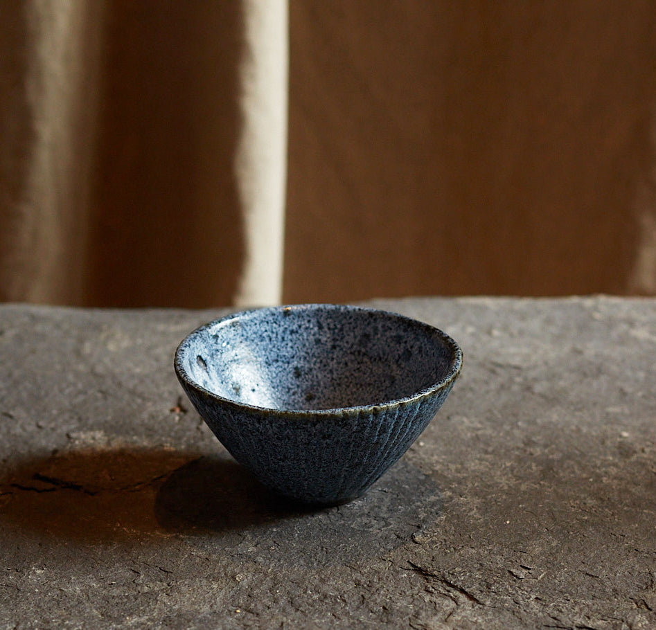 Black stoneware bowl by Sara Mauvilly