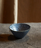 Black stoneware bowl by Sara Mauvilly