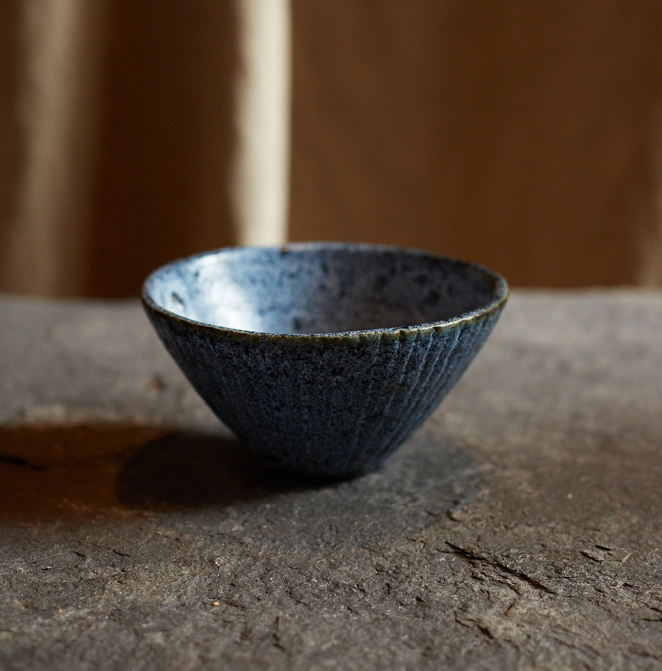 Black stoneware bowl by Sara Mauvilly