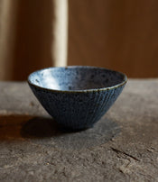 Black stoneware bowl by Sara Mauvilly