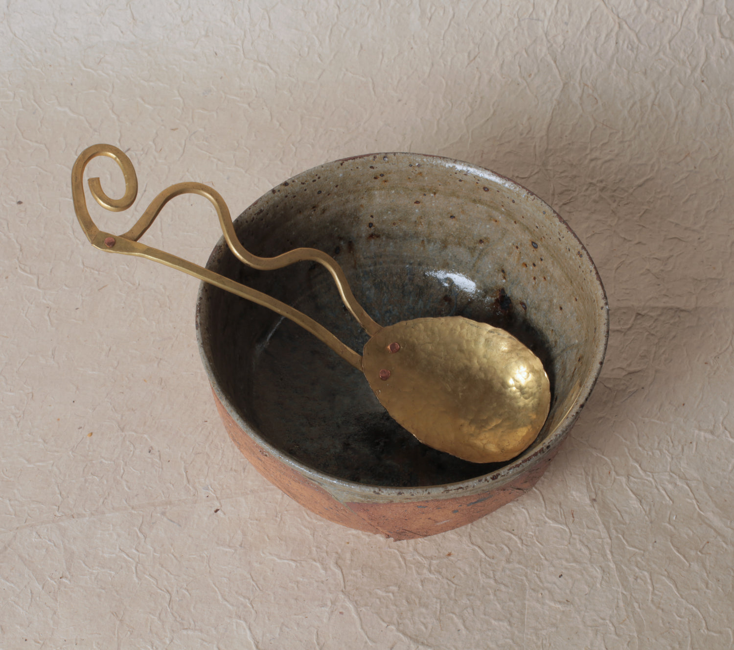Brass serving spoon by Sebastião Lobo