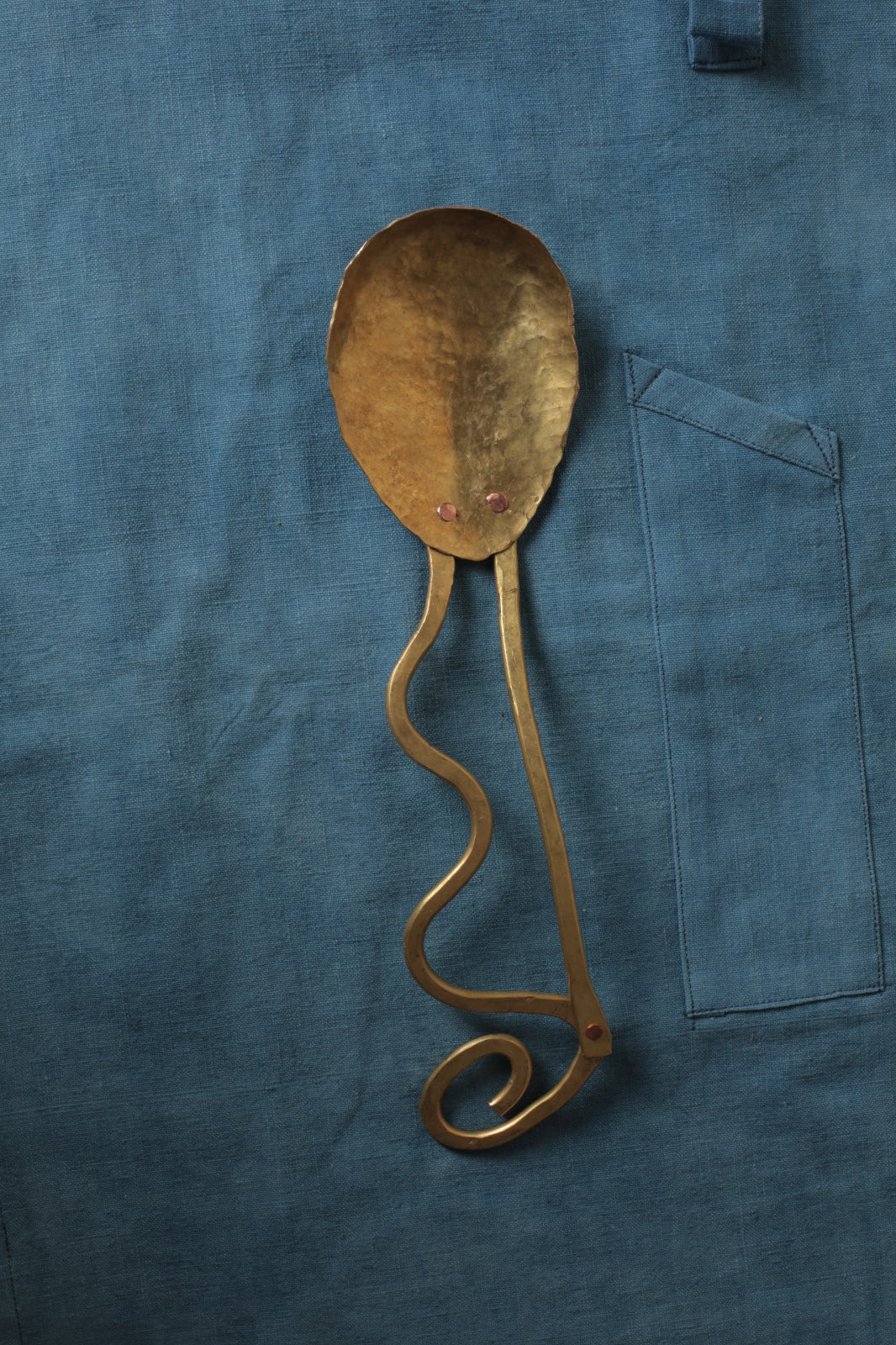 Brass serving spoon by Sebastião Lobo