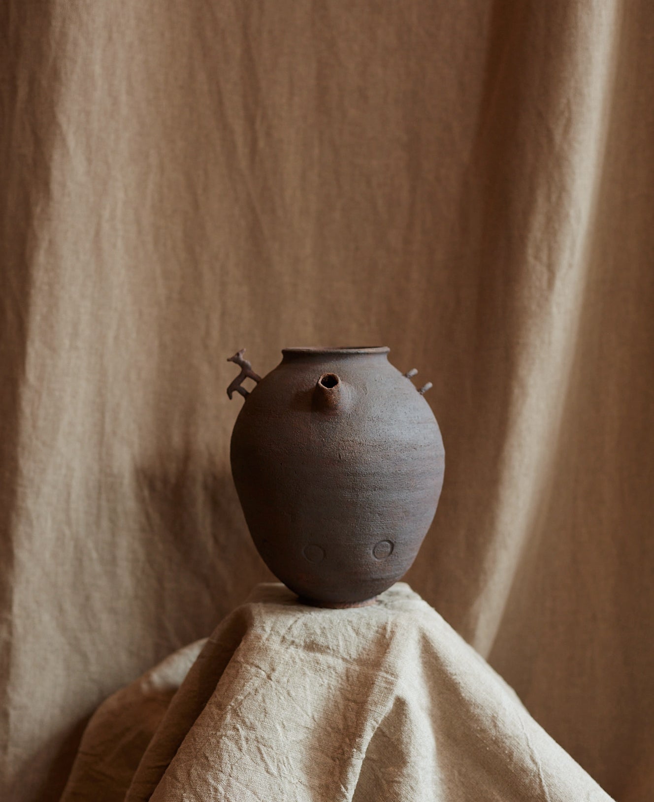 AMPHORA IN SANDSTONE BY BENJAMIN DOSGHEAS