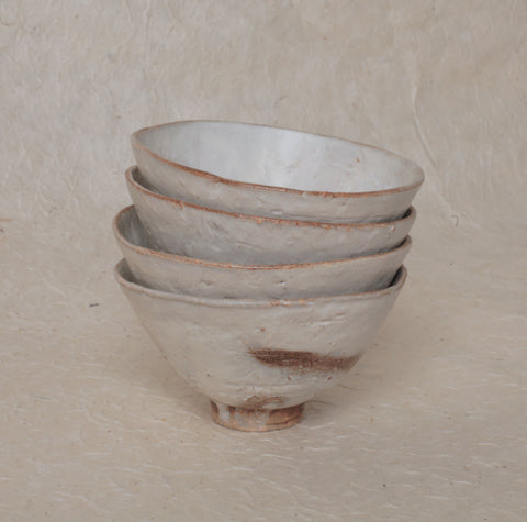 White stoneware bowls by Jérôme Hirson