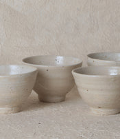 Stoneware teapot and cup by Marie Lautrou