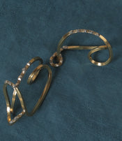Bronze napkin rings by Zoé Mohm in collaboration with l'Oeil de KO