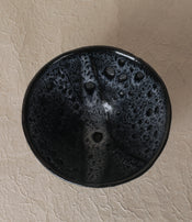 Black stoneware bowl by Sara Mauvilly