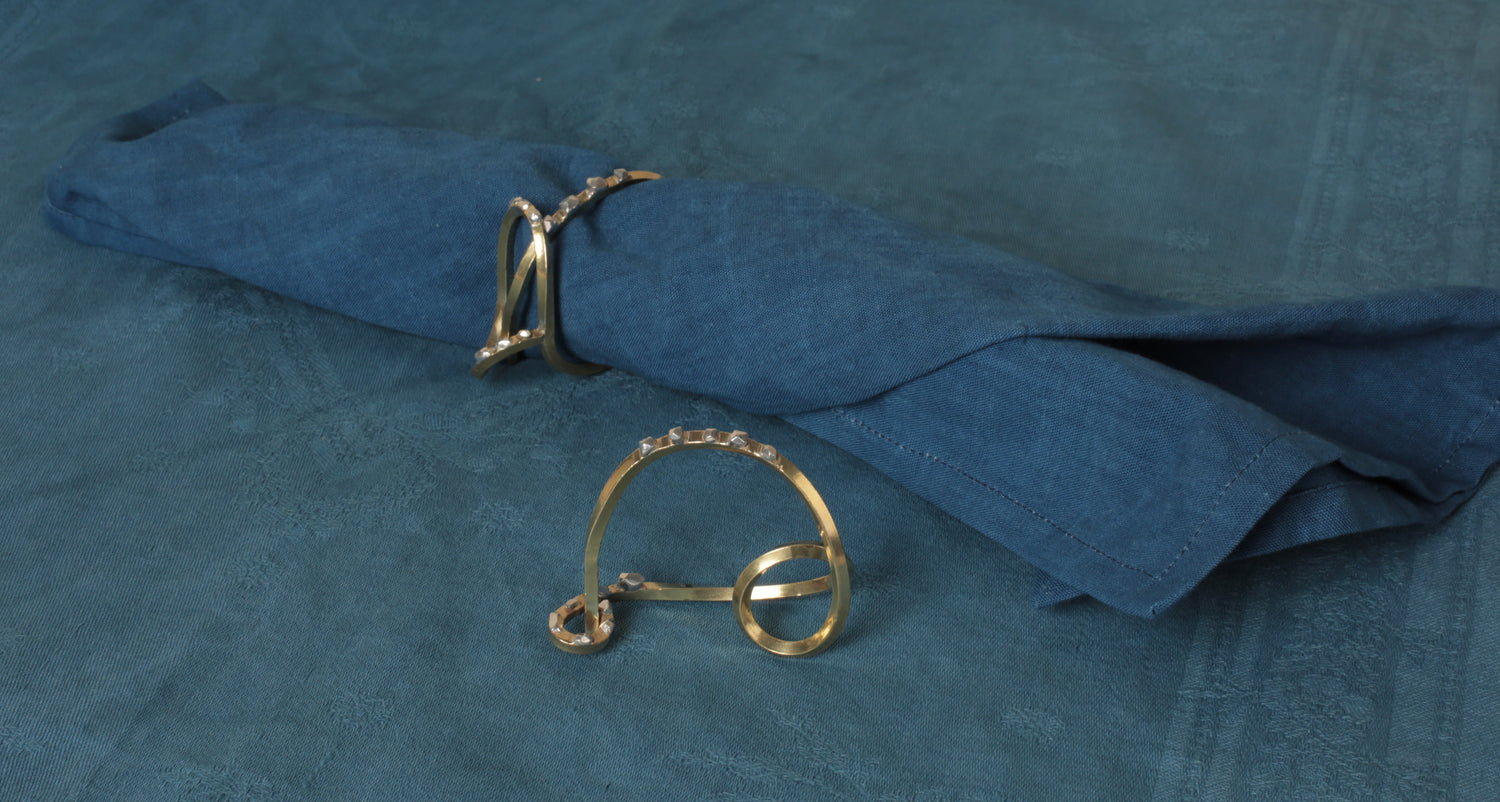 Bronze napkin rings by Zoé Mohm in collaboration with l'Oeil de KO
