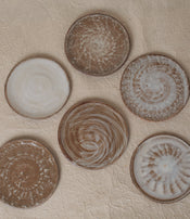 Small stoneware plates by Marie Lautrou