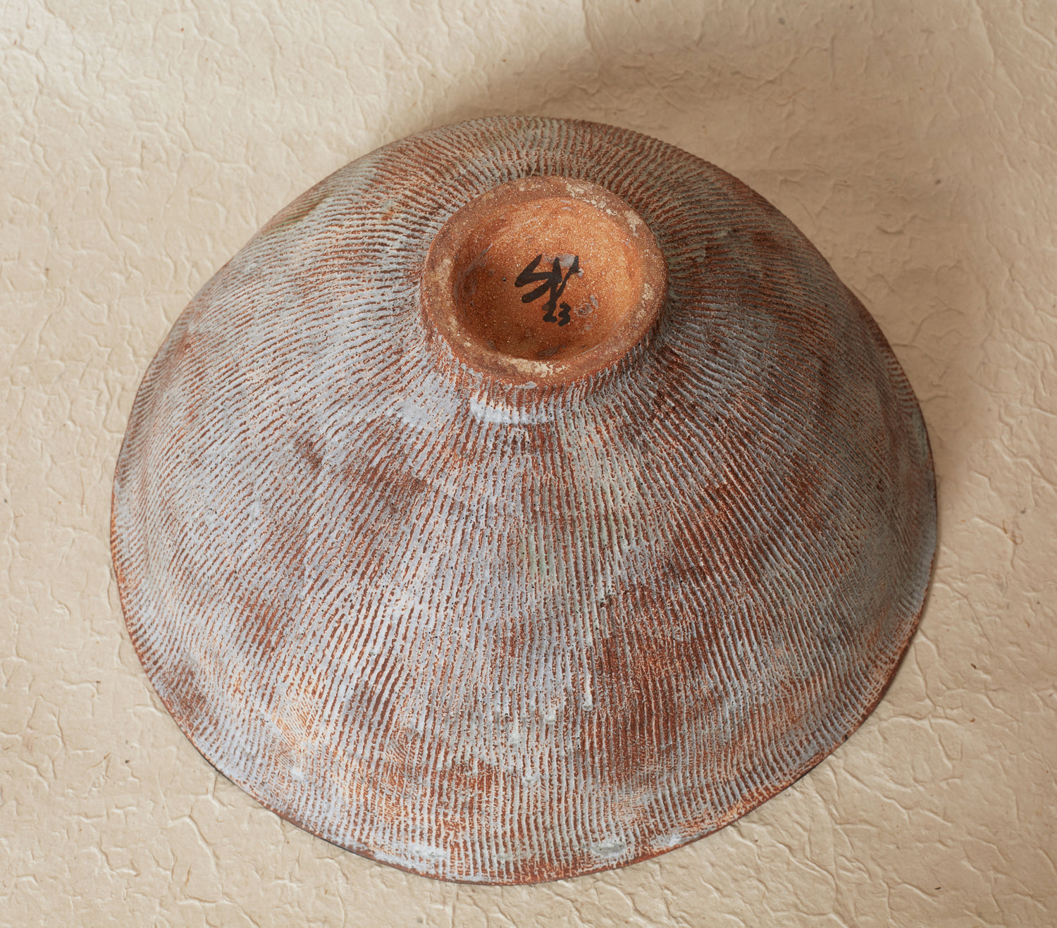 Striated ceramic bowl by Silvia Valentin
