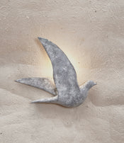 Bronze bird wall lamp by Eloïse Van der Heyden.